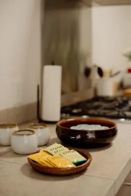 a kitchen counter with a plate of food on it at Stylish Penthouse in West Hollywood in Los Angeles