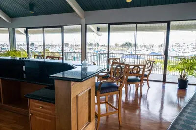 a large kitchen with a view of a marina at Waterfront 104 in Oxnard
