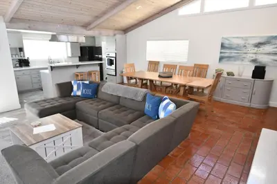 a living room with a couch and a table at Ocean Blue in Oxnard