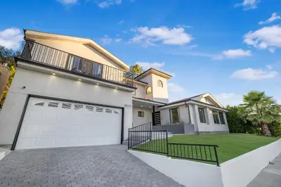 a large white house with a garage at Rancho Haven in Los Angeles