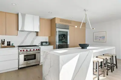 a kitchen with a counter and a stove top oven at Playa Del Sol by Stay Awhile Villas in Malibu Beach