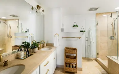 a bathroom with two sinks and a shower at Oceanfront Artists Retreat Santa Monica Luxury in Los Angeles