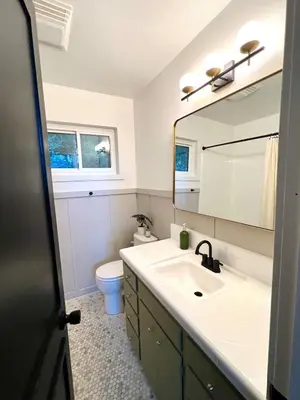 a bathroom with a sink and a mirror at Fam & Pet Friendly Chalet w AC & BBQ - Top Rated in Crestline
