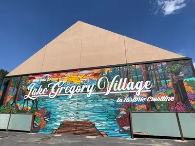 a building with a painting on the side of it at Fam & Pet Friendly Chalet w AC & BBQ - Top Rated in Crestline