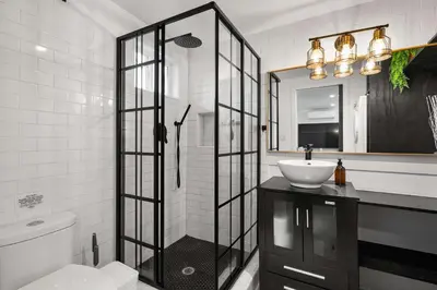 a bathroom with a sink and a mirror at New Listing Palisades Villa by Colby & Conrad in Los Angeles