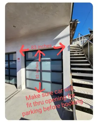 a sign on the side of a building with arrows on it at Feel At Home At A One Bedroom Apt 1 Block From The Beach in Hermosa Beach
