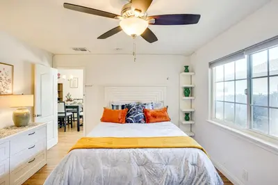 a bedroom with a bed and a ceiling fan at Explore SoCal! Cozy Retreat Near Disney and Beaches in Westminster