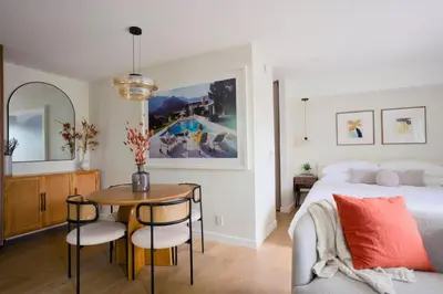 a bedroom with a bed and a table with chairs at New Venice Beach Zen Hideaway in Los Angeles