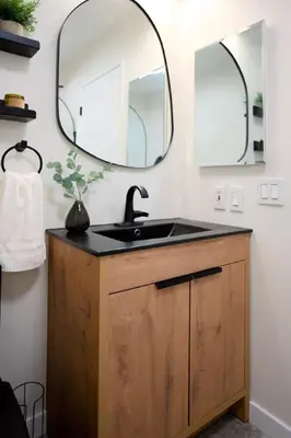 a bathroom with a sink and a mirror at New Venice Beach Zen Hideaway in Los Angeles