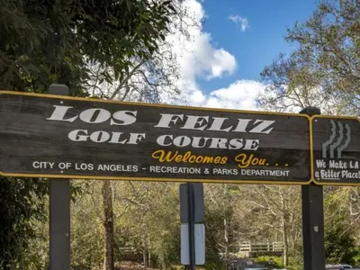 a sign that reads los felicitos golf course at 242 Charming, Peaceful Apartment Retreat in Griffith in Glendale