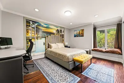 a bedroom with a bed and a desk and a computer at Allura Studio City Mediterranean with Private Pool in Los Angeles