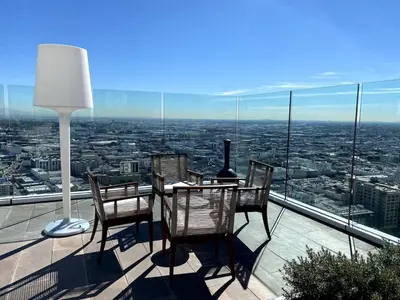 a table and chairs sitting on top of a building at Luxury Vacation Resort Studio Downtown LA in Los Angeles