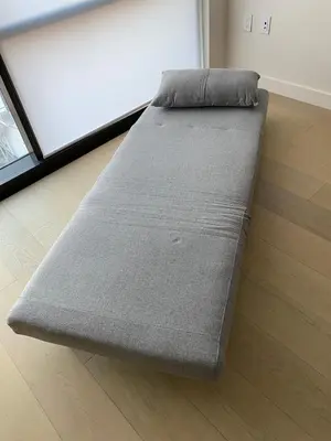 a large bed sitting on the floor in a room at Luxury Vacation Resort Studio Downtown LA in Los Angeles