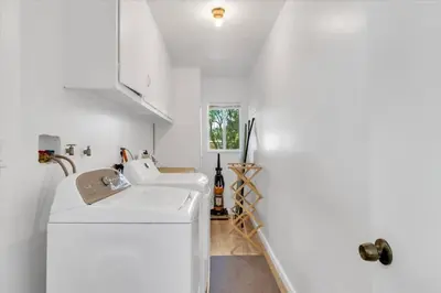 a kitchen with a white sink and a white cabinet at Peaceful, Los Angeles Family Vacation, Relocation Home in Los Angeles