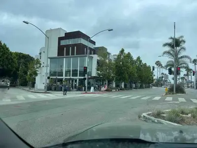 an intersection of a street with a large building at Cheerful house with EV, Parking & backyard in Los Angeles