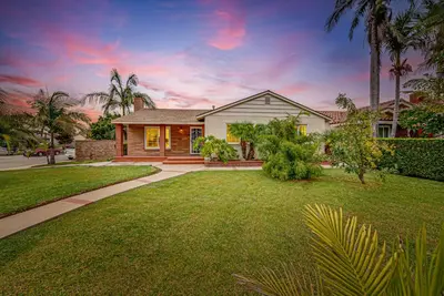 a house with a lawn in front of a house at Entire 4BR 4BA House in West Covina Modern Private Comfortable in West Covina