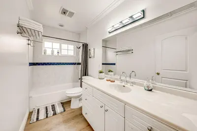 a white bathroom with a sink and a toilet at Entire 4BR 4BA House in West Covina Modern Private Comfortable in West Covina
