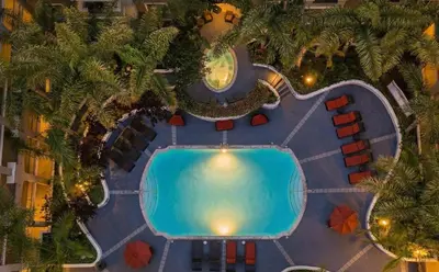 an overhead view of a swimming pool in a resort at Marina Del Rey Sunrise - Pool & Gym & Sauna & Cinema in Marina del Rey