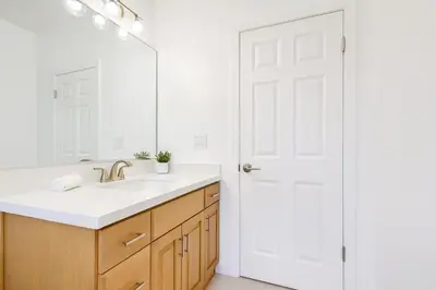 a bathroom with a sink and a mirror at Malibu Woods & Waves - 2 Bedroom in Malibu