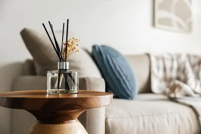 a living room with a table with a vase on it at Superior 2 bedroom apartment in Heart of Hollywood in Los Angeles