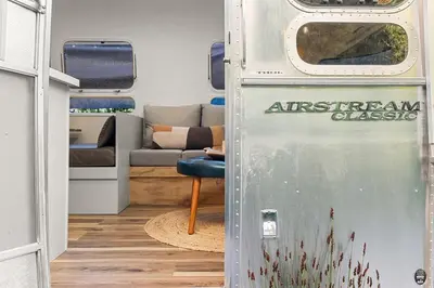 an entrance to an airstream garage with a living room at Hip Venice Beach Luxury Airstream & Creative Space in Los Angeles