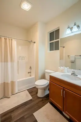 a bathroom with a toilet sink and a shower at Marina Del Rey Luxe 2-Bedroom & 1-Bedroom - Hot Tub, Pool Table, Grill & Cinema Projector in Marina del Rey