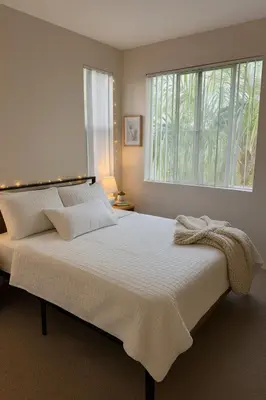 a bedroom with a large bed with a window at Sunny Marina Del Rey Apartment- Hot Tub, Game Room, BBQ, Projector in Los Angeles
