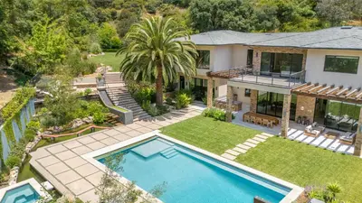 an aerial view of a house with a swimming pool at Bowmont in Los Angeles