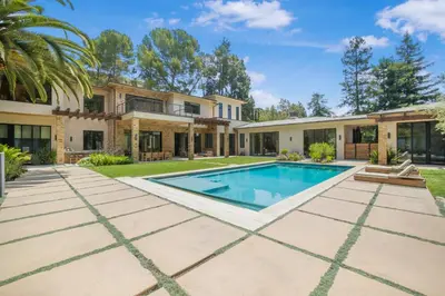 an exterior view of a house with a swimming pool at Bowmont in Los Angeles