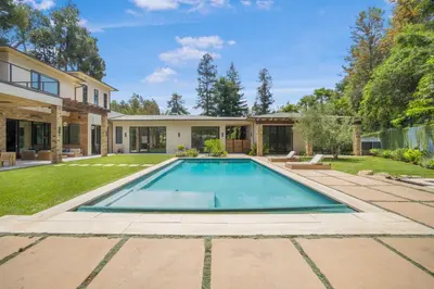 a swimming pool in the backyard of a house at Bowmont in Los Angeles