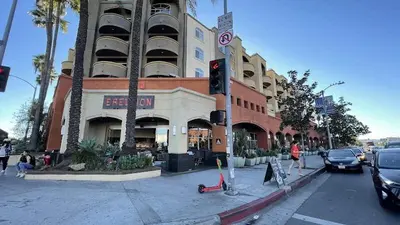 a street with a traffic light in front of a building at Cozy and Stylish Unit CC 107 in Los Angeles
