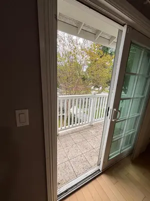 an open door to a patio with a porch at Private room private balcony shared bathroom - Mini Mansion in Burbank