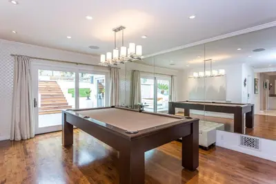 a large room with a pool table in it at Sunset Strip 5 Star Location w Pool Jacuzzi Cabana BBQ in Los Angeles