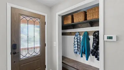 a door leading into a room with a closet at 5BDR Stay w Fireplace Game room Family-Friendly Amenities Arrowhead Chalet by AvantStay in Lake Arrowhead