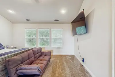 a living room with a couch and a tv at Walk to Lake Arrowhead! Family Home with Games in Lake Arrowhead