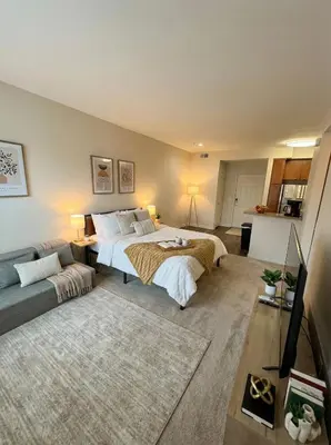 a bedroom with two beds and a couch at Beachside Marina Del Rey 2BR & 1BR - Resort Amenities in Los Angeles