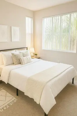 a large white bed in a bedroom with a window at Beachside Marina Del Rey 2BR & 1BR - Resort Amenities in Los Angeles