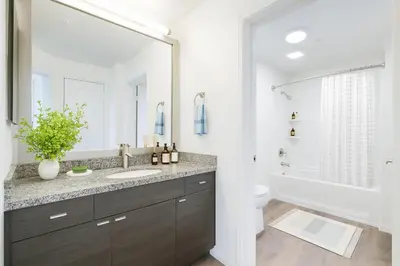 a bathroom with a sink and a mirror at Beachside Marina Del Rey 2BR & 1BR - Resort Amenities in Los Angeles