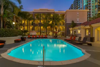 a swimming pool in front of a hotel at Marina Del Rey Beach Retreat w Hot Tub, Billiards & Grill in Los Angeles