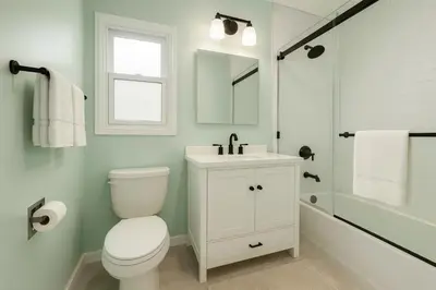 a bathroom with a toilet and a sink and a shower at Fullerton Family-Ready- 9 min to Disneyland in Fullerton
