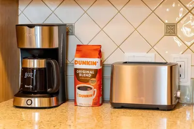a coffee maker and a toaster on a counter at Fullerton Parkside Getaway - 13min to Disneyland in Fullerton