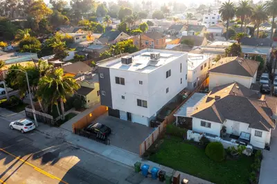 an aerial view of a residential neighborhood with a white house at Dondo Stay in Los Angeles