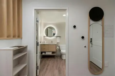 a bathroom with a sink and a mirror at TownePlace Suites by Marriott Ridgecrest in Ridgecrest