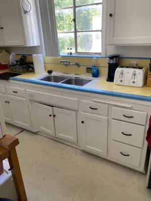 a kitchen counter with a sink and a window at Beautiful apartment close to Cedars! Beverly Hills in Los Angeles
