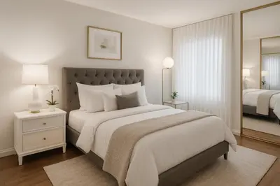 a white bedroom with a large bed and a mirror at Marina Del Rey Getaway - Resort Amenities in Marina del Rey in Los Angeles