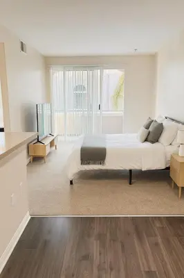 a bedroom with a large bed and a large window at Marina Del Rey Getaway - Resort Amenities in Marina del Rey in Los Angeles