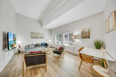 a living room with a couch and a table at Oneluxstay 3BR Home Near the Beach in Redondo Beach