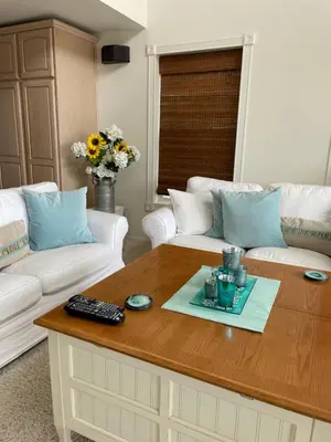 a living room with a couch and a coffee table at Luxury, Beach House, and quiet neighborhood in Oxnard