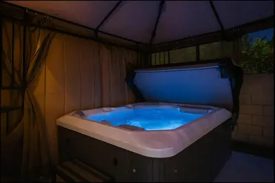 a jacuzzi tub in a tent with at South Pasadena Studio Spa Escape in South Pasadena