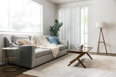 a living room with a couch and a table at Pearl 2B apartment in Marina with parking, Pool and Gym in Los Angeles